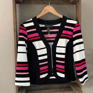 Stylish zip front sweater. Item does not have tags but it has never been worn.